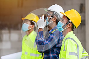 Close up team construction worker control in the House structure at construction site