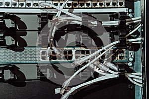 Close up of technician setting up network in server room