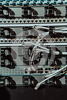 Close up of technician setting up network in server room