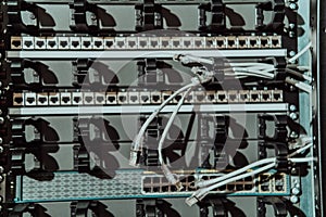 Close up of technician setting up network in server room