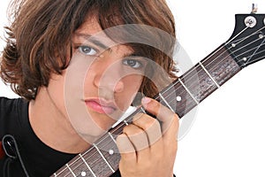 Close Up of Teen Boy With Electric Guitar Over White