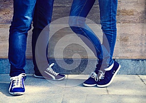 Close up of a teen couple wearing shoes