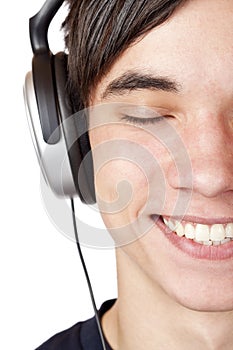 Close-up teenager listen to music with headphone