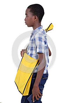 close-up of a teenager with a shoulder bag and a mobile phone