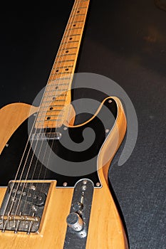 Close up of a Telecaster natural electric guitar