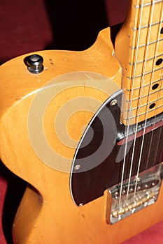 Close up of a Telecaster natural electric guitar