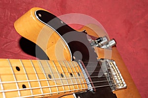 Close up of a Telecaster natural electric guitar