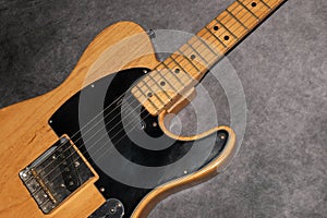 Close up of a Telecaster natural electric guitar