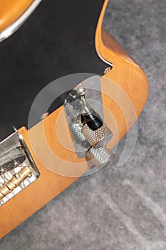 Close up of a Telecaster natural electric guitar