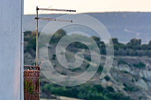 Close Up of Television Antennas mounted on a Balcony in Italy photo