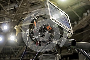 Close-up television camera at sports competitions, TV broadcasting.