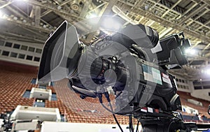 Close-up television camera at sports competitions, TV broadcasting.