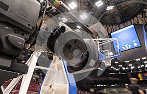 Close-up television camera at sports competitions, TV broadcasting.