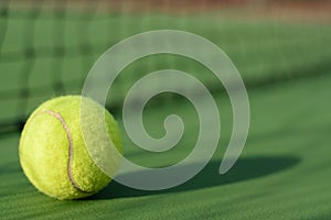 Tennis ball on blur net