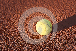 Close up of tennis ball on clay court./Tennis ball , vintage