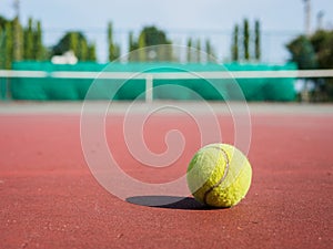 Close up of tennis ball on the court. Sport active concept.