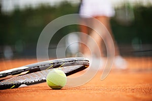 Close up of tennis balls on tennis court. Sport concept