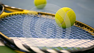 Close up of tennis equipment on the court. Sport, recreation concept.