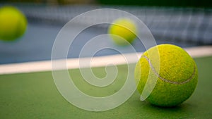 Close up of tennis equipment on the court. Sport, recreation concept.