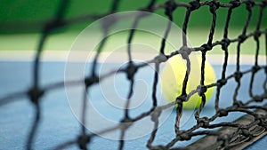Close up of tennis equipment on the court. Sport, recreation concept.