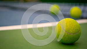 Close up of tennis equipment on the court. Sport, recreation concept.