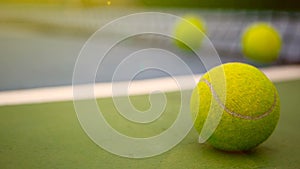 Close up of tennis equipment on the court. Sport, recreation concept.