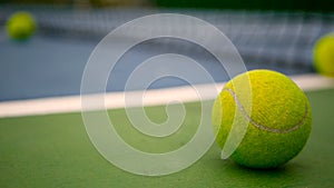 Close up of tennis equipment on the court. Sport, recreation concept.