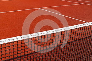 Close-up of tennis net on the court background