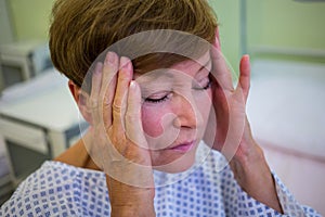 Close-up of tensed senior patient