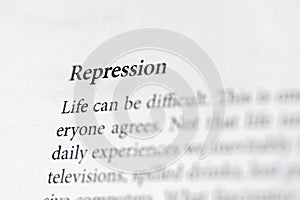 close-up of the term Repression, on paper background