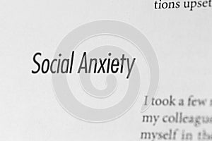close-up of the term social anxiety on paper background