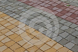 Close-up of tessellated concrete slabs texture. Tiled pavement paving in square shape. Tile Construction road