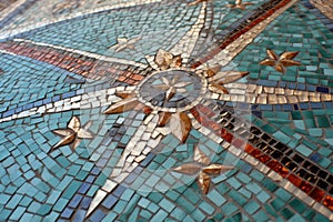 close-up of tesserae tiles creating a roman mosaic design