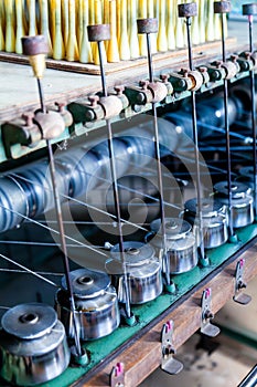 Close Up Textile Industry Yarn Spools on Spinning Machine in a F
