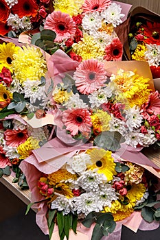 Close-up texture, background of flowers. Bouquet of flowers - gerbera, carnation, roses