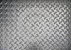 Close-up of the texture of a corrugated steel sheet. Corrugated lentil pattern.