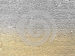 Close-up texture of hebel wall surface with natural rough pattern and gradient tone, symbolizing construction, strength, and raw i