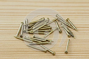 Close up texture of nails, Brass Nails on wooden board