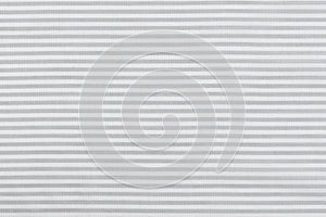 close-up texture of natural cotton calico fabric in gray and white stripes. background for your mockup