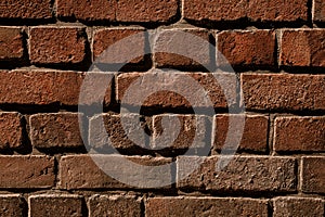 Close-up texture of red brick wall. Abstract background pattern