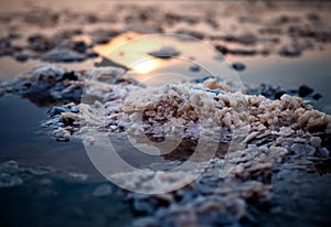 Close-up of the texture of salt crystals in water