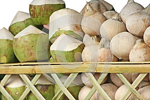 Texture stacked coconuts isolated on white background