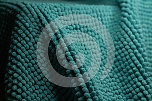 Close-up texture of a terry towel. Blue fabric.