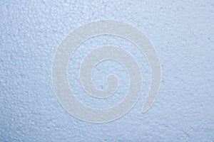 Close up texture of white styrofoam surface with soft lighting