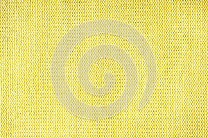 Close up texture of yellow coarse weave upholstery fabric. Decorative textile background