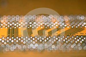 Close up texture of a yellow printed circuit board