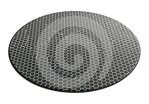 Close up of a textured circular surface with a hexagonal pattern isolated on white background