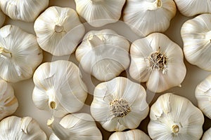 close up textured made from garlic bulbs for sale at a farmers marke, top view photo