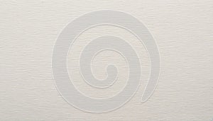 Close-up of a textured, off-white paper surface.