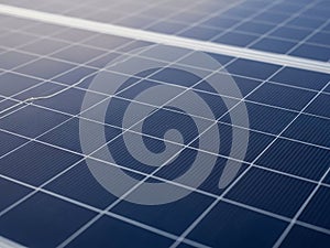 Close up of a textured solar panel surface with grid lines